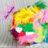 A pumpkin turned DIVA with feathers, modpodge, and glitter!