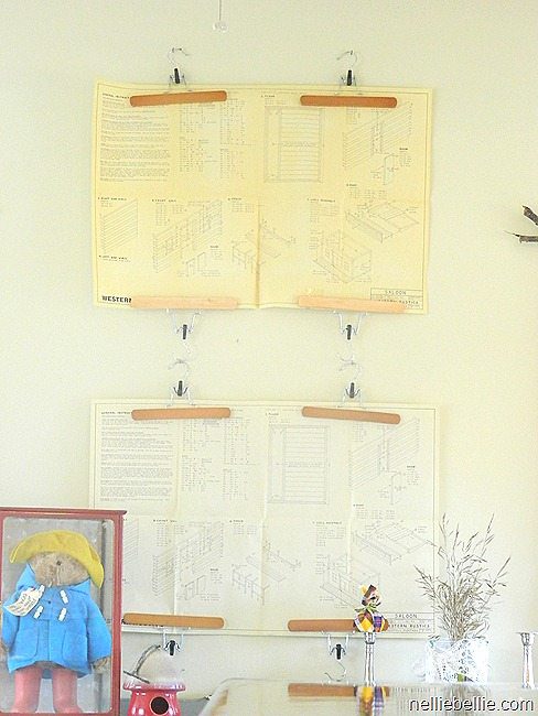use pant hangers to hang pictures!