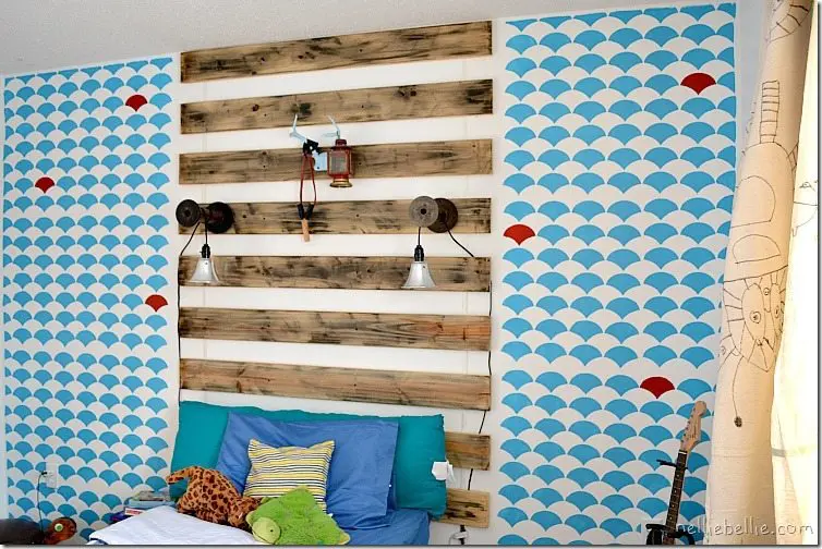 tips and tricks for decorating a boy's bedroom on a budget. This room was under $150 with some great repurposing and clever hacks!