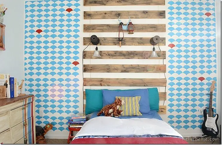 tips and tricks for decorating a boy's bedroom on a budget. This room was under $150 with some great repurposing and clever hacks!