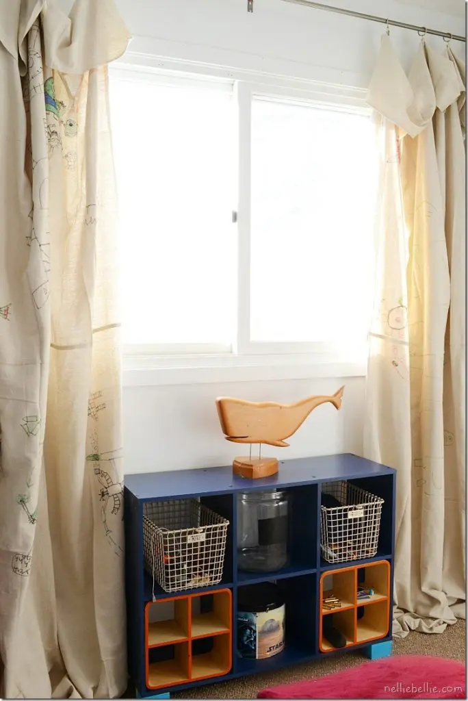 tips and tricks for decorating a boy's bedroom on a budget. This room was under $150 with some great repurposing and clever hacks!