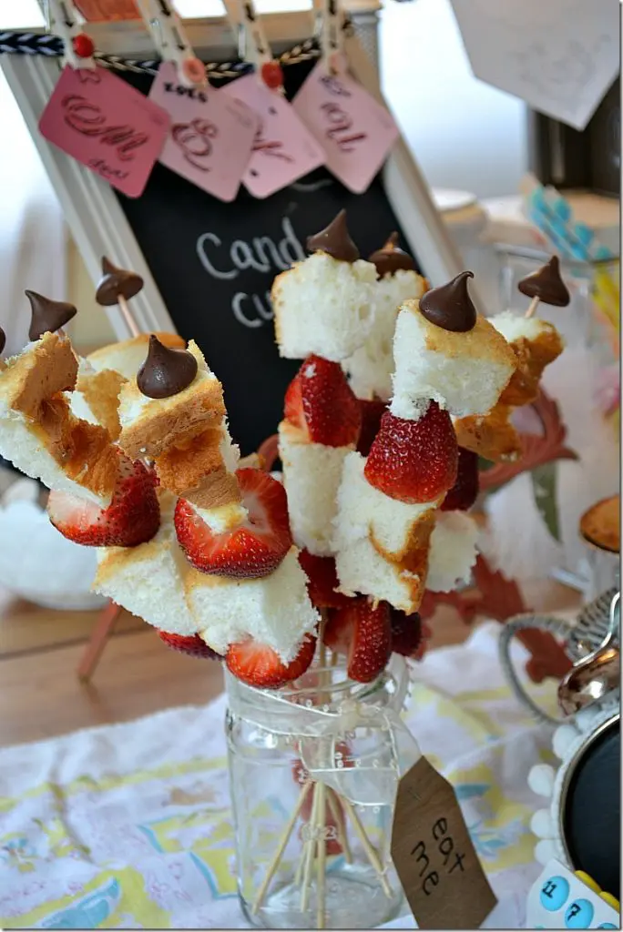 Strawberry Shortcake skewers. Angelfood cake and strawberries with a Hershey kiss on top. Strawberry Shortcake skewers. Angelfood cake and strawberries with a Hershey kiss on top.