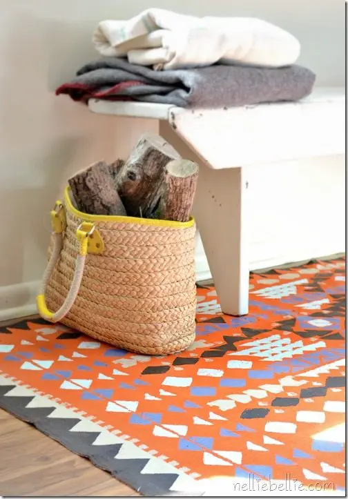make a rug with a drop cloth and paint. Full tutorial.