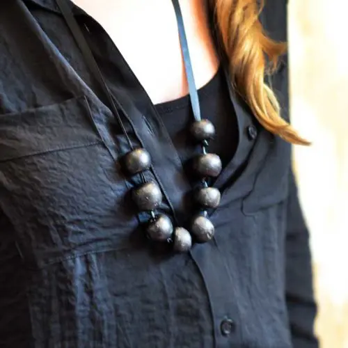 This tutorial for clay beads from NellieBellie is perfect for helping beginners understand how incredibly simple these are to make, especially because it doesn't get into any complicated designs or etchings. The clay used can be found pretty much anywhere, and a simple ribbon also makes this easy for anyone to try!