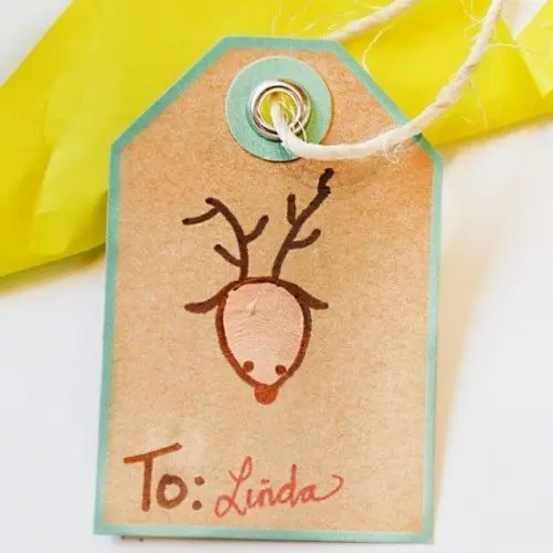 Thumbprint Christmas gift tags are a perfect way to include small children in the gift wrapping process. These are simple, easy and fun!