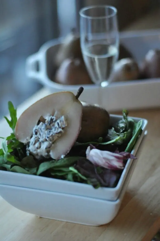 Poached pear with wild rice filling are delicious and healthy! A MN favorite!