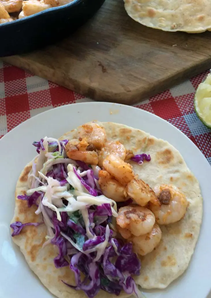 shrimp tacos are an easy, healthy dinner. This recipe uses Jalapeno Cilantro Coleslaw that is yummy! 