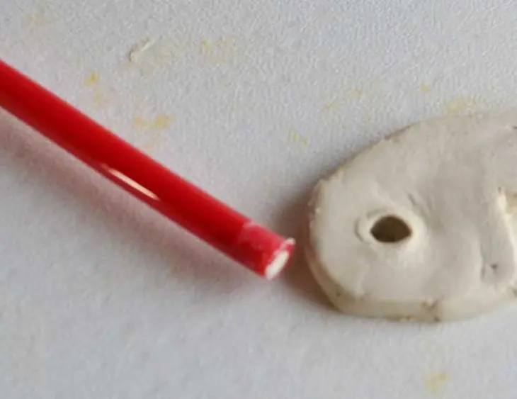 easy clay heart bookmarks. These are made with air-dry clay found at your local store. They are easy to make and great to personalize for Valentine's day with your child's thumbprint! Great idea for gifts.