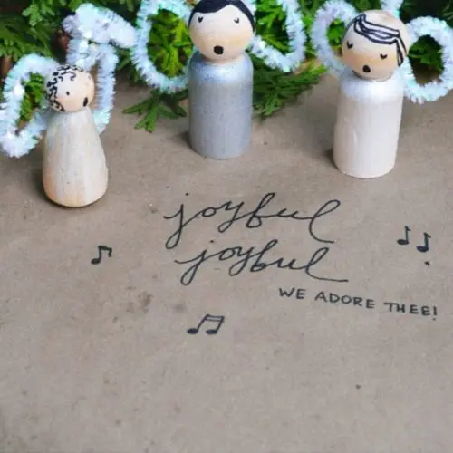 Make these darling ornaments from peg people, pipe cleaners, and paint. An easy Christmas ornament idea!