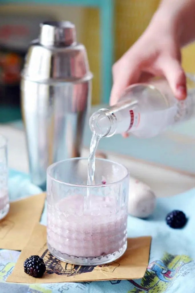 A Blackberry Coconoff cocktail is an easy recipe featuring muddled blackberries, agave nectar, and coconut milk topped with Smirnoff. Yummy, refreshing, and light Smirnoff cocktail!