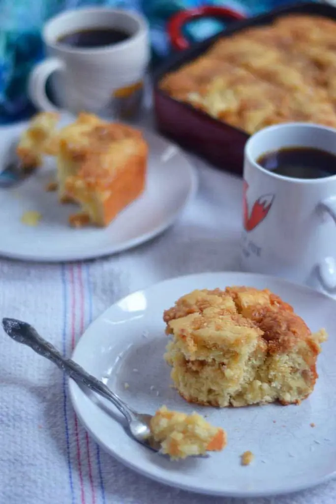 Pineapple yogurt coffee cake with coconut crumble is an traditional coffee cake recipe with a couple updates. You'll love this buttery and fresh cake recipe paired with the smooth coconut crumble. A great recipe for Easter brunch!