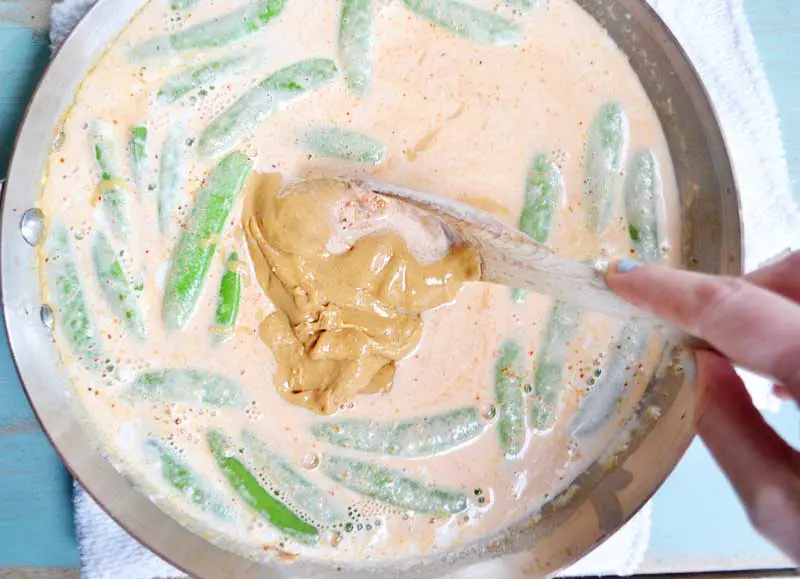 This 15-minute Peanut Curry and Rice is the go-to recipe for my home. I keep the ingredients in my pantry at all times to pull out on those evenings when you simply don't have the time and energy to think about dinner. This flavorful recipe is fast, delicious, and nutritious.
