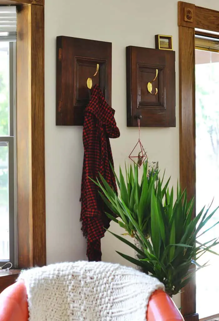 The repurposed cabinet doors into coat racks! Super charming and simple DIY