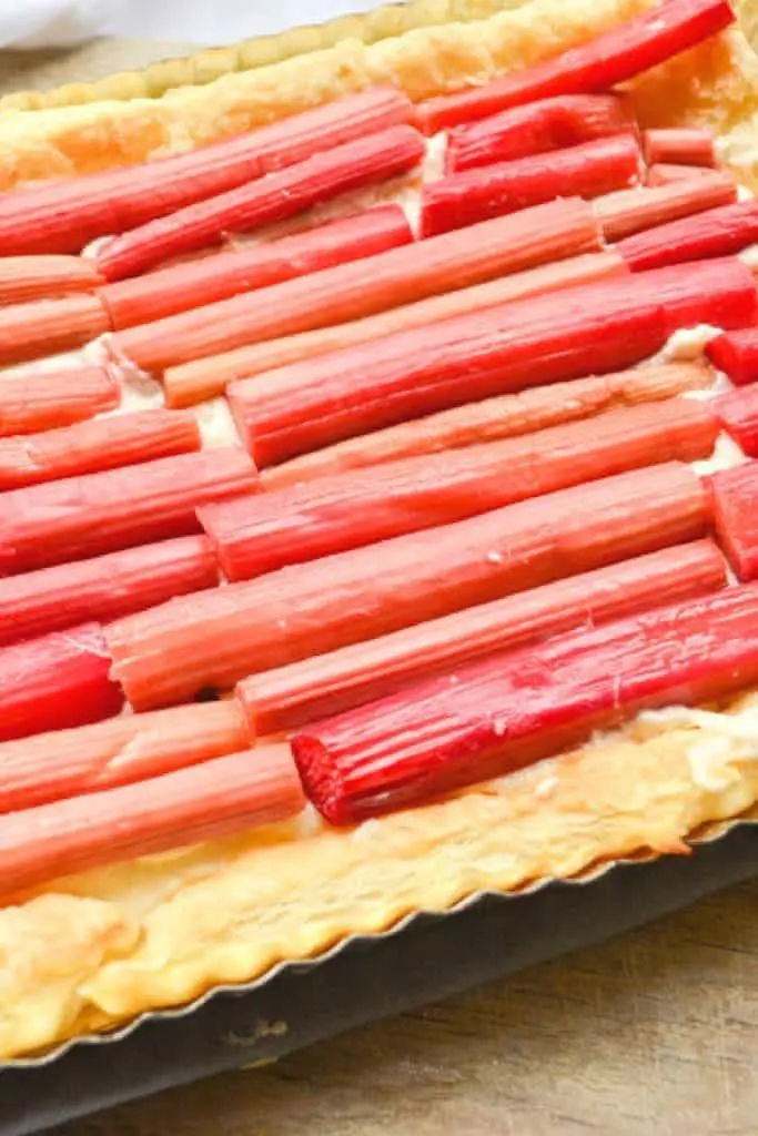 easy Rhubarb Puff Pastry Tart recipe. A great summer dessert recipe to use up the abundant rhubarb!
