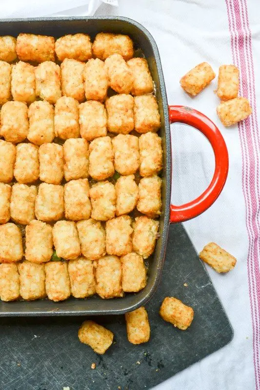Also called "tater tot casserole", tater tot hotdish is a traditional Minnesotan dish complete with a variety of veggies and tater tots on top.