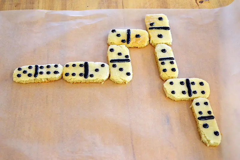 Make up a batch of these edible cookie dominoes to get kids in the kitchen learning and building their math AND cooking skills!
