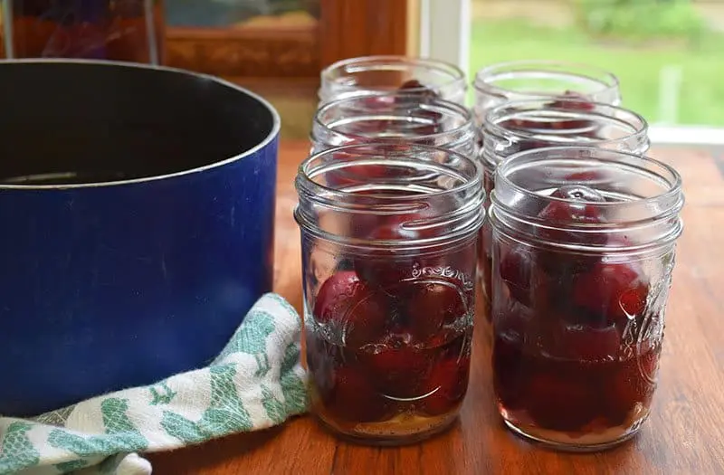 Make your own cherry-infused bourbon with this easy and simple process. A great gift idea, cocktail ingredient, and treat for bourbon lovers.