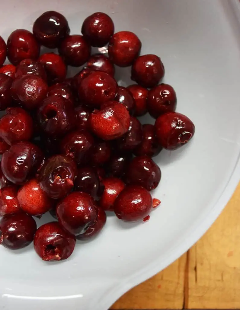 Make your own cherry-infused bourbon with this easy and simple process. A great gift idea, cocktail ingredient, and treat for bourbon lovers.