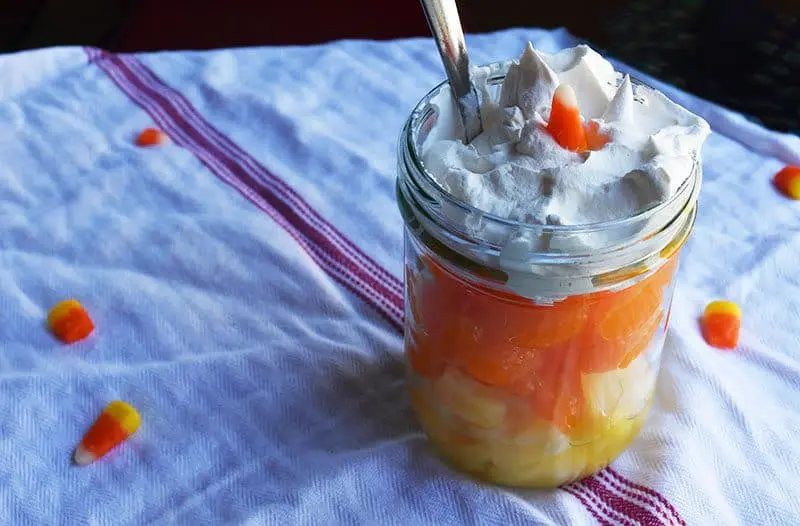 easy 3 ingredient Halloween candy corn fruit cup. Yum!! A great after-school snack.