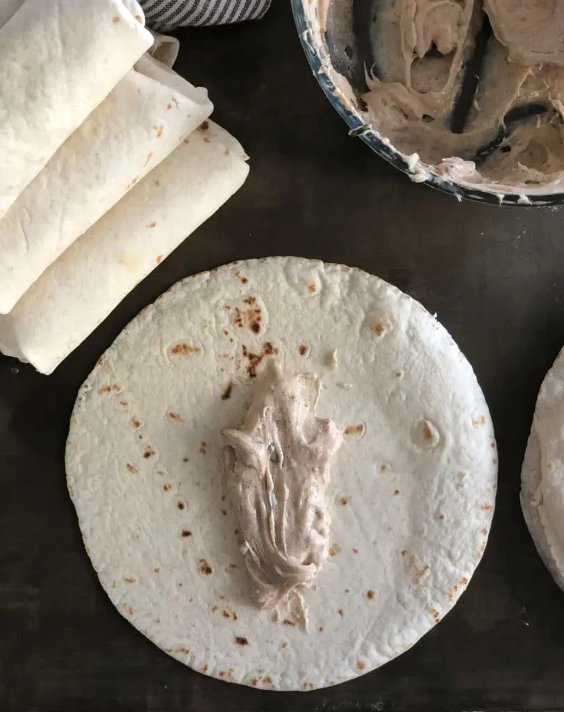 cream cheese filling in strawberry burrito