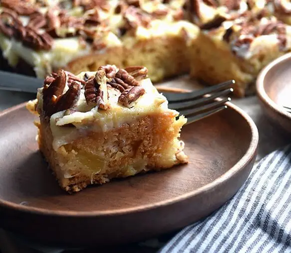 2 slices of pineapple cake on plates