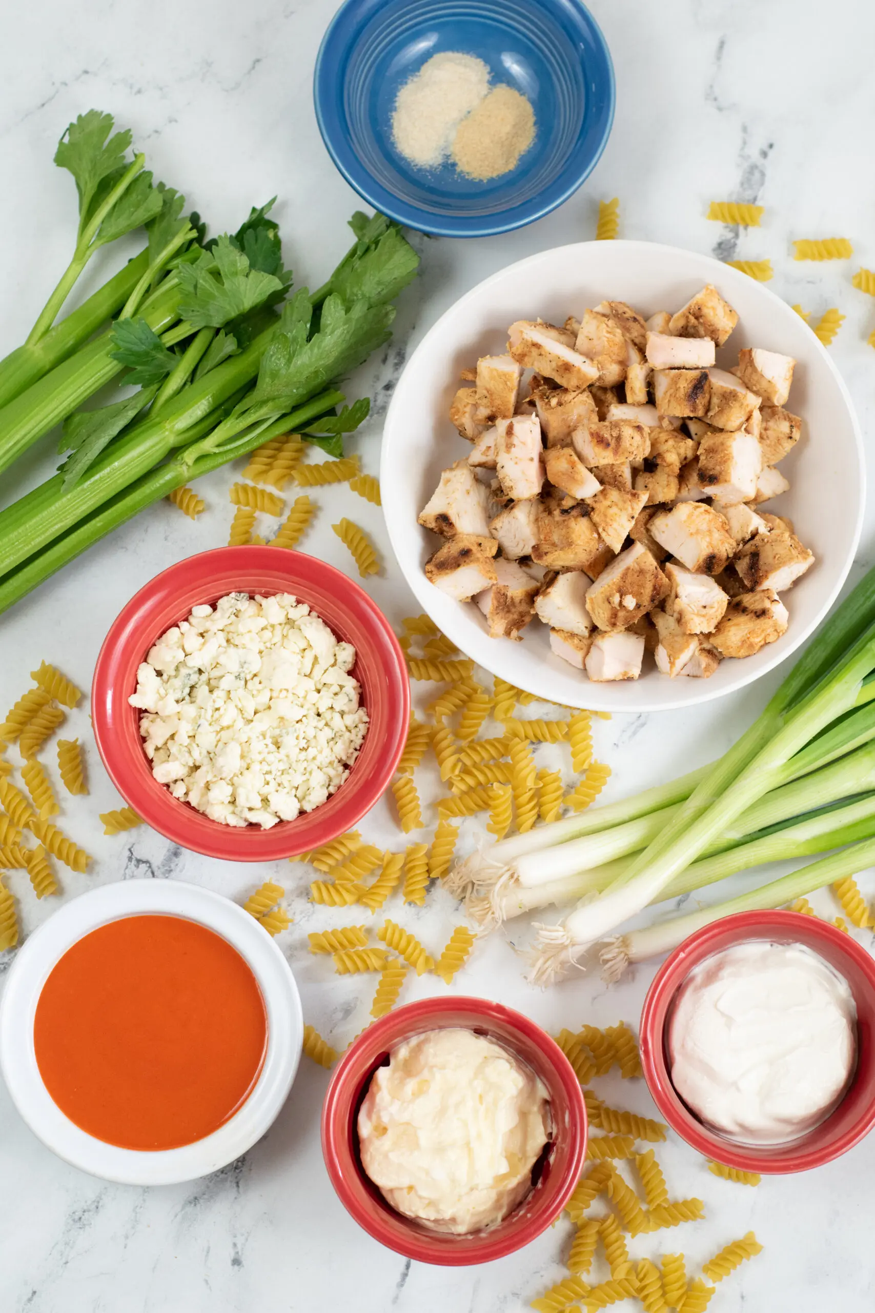 Ingredients for buffalo chicken pasta salad