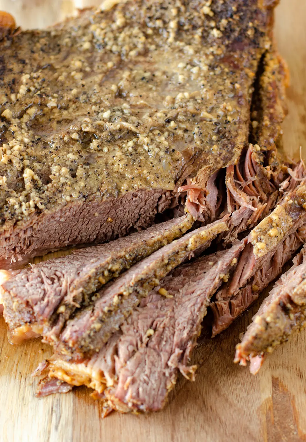 Beef Brisket on a cutting board, sliced.