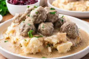 swedish meatballs on a pile of mashed potatoes