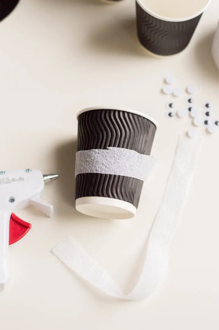 Halloween treat cup step 1: wrap with white streamers