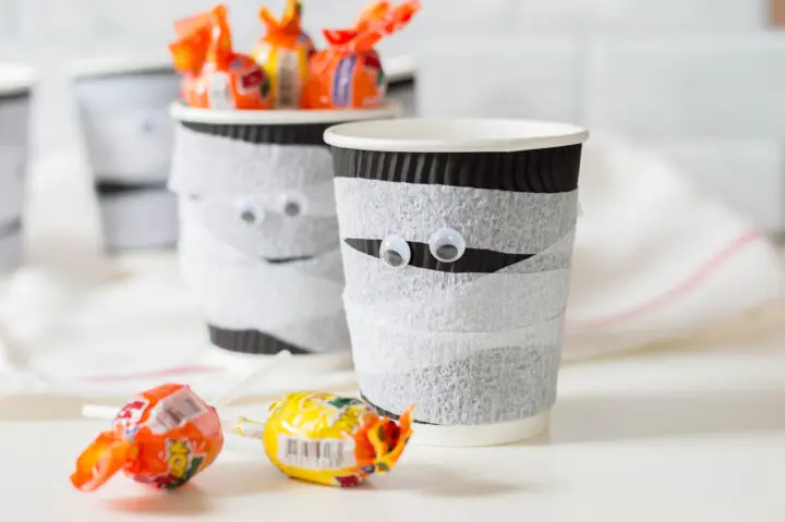 Mummy Halloween treat cups filled with candy
