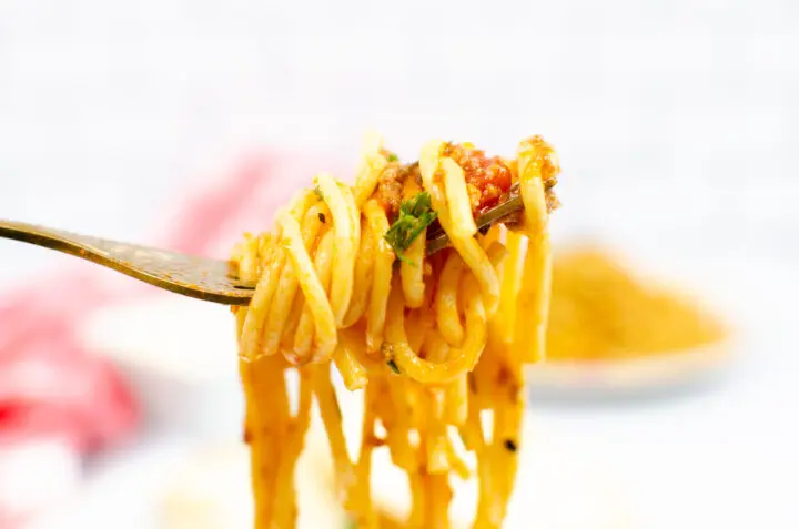 A forkful of Instant Pot spaghetti noodles and sauce