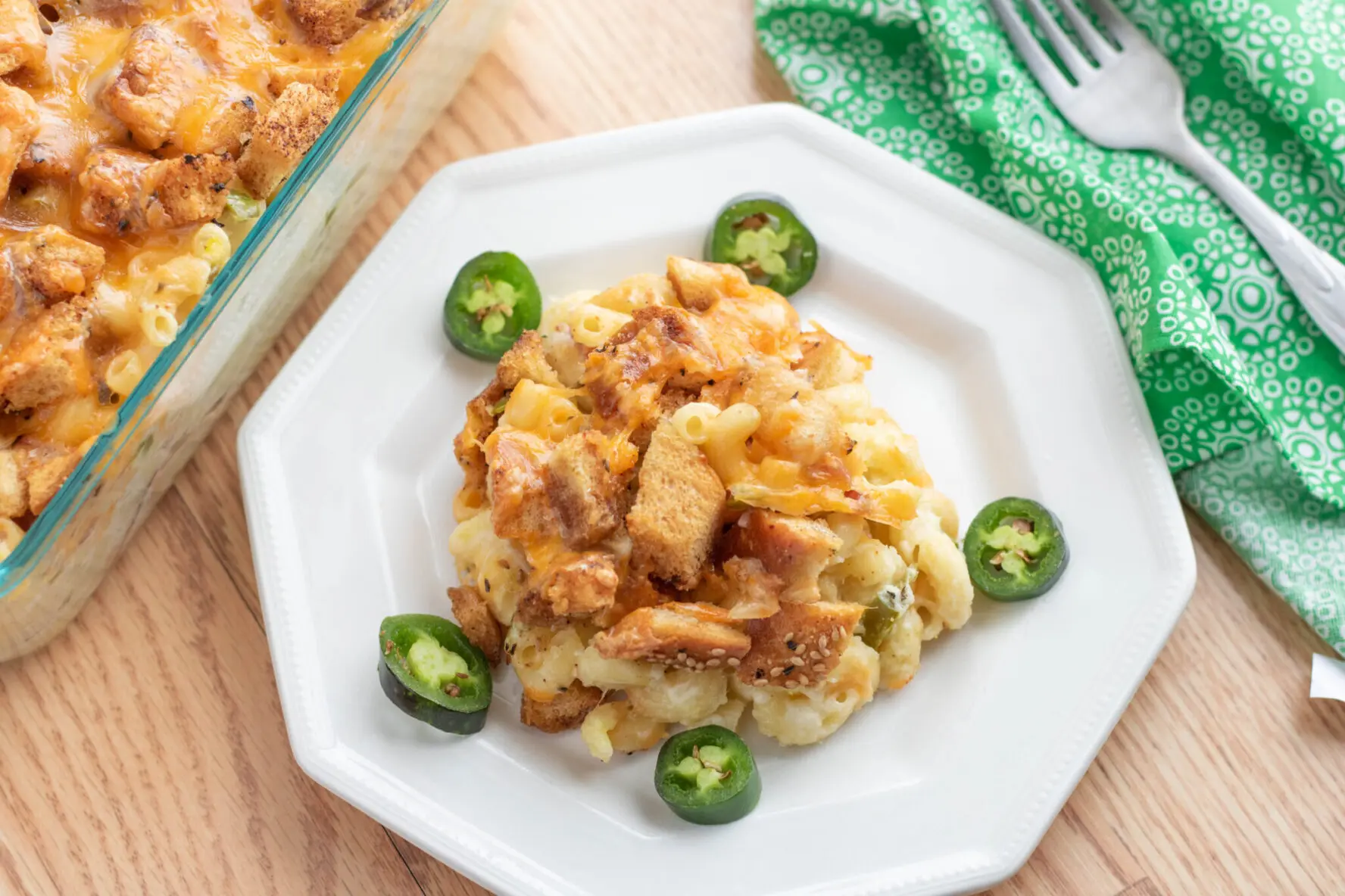 Jalapeño Popper baked macaroni and cheese on a plate ready to be eaten.
