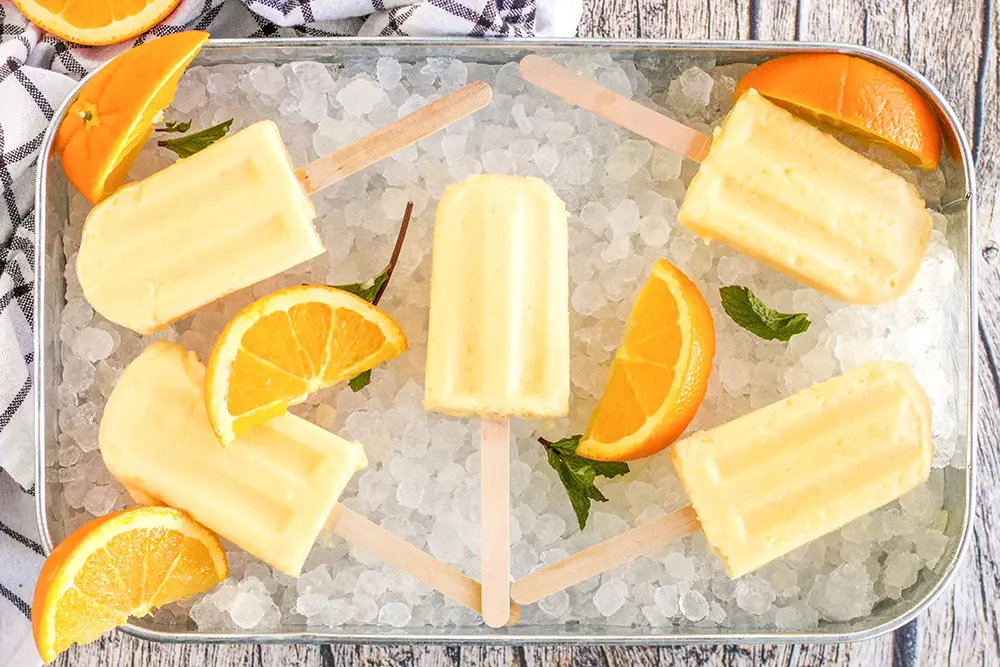 Keeping popsicles cool in a pan full of ice.