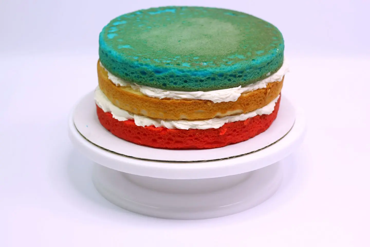 layered red, white, and blue 4th of July cake from NellieBellie