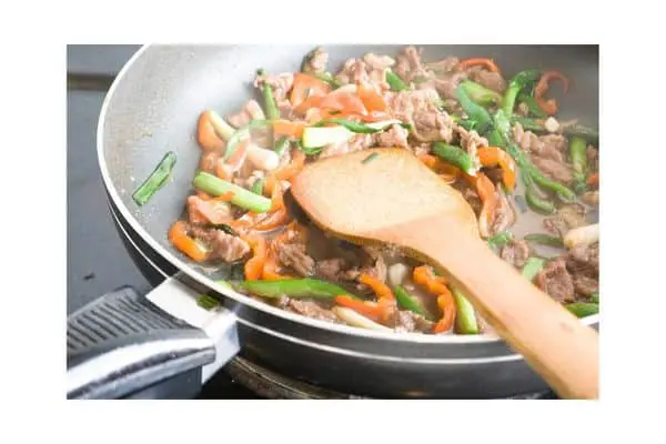 stirfry in a pan is a great use of leftover veggies and meats.