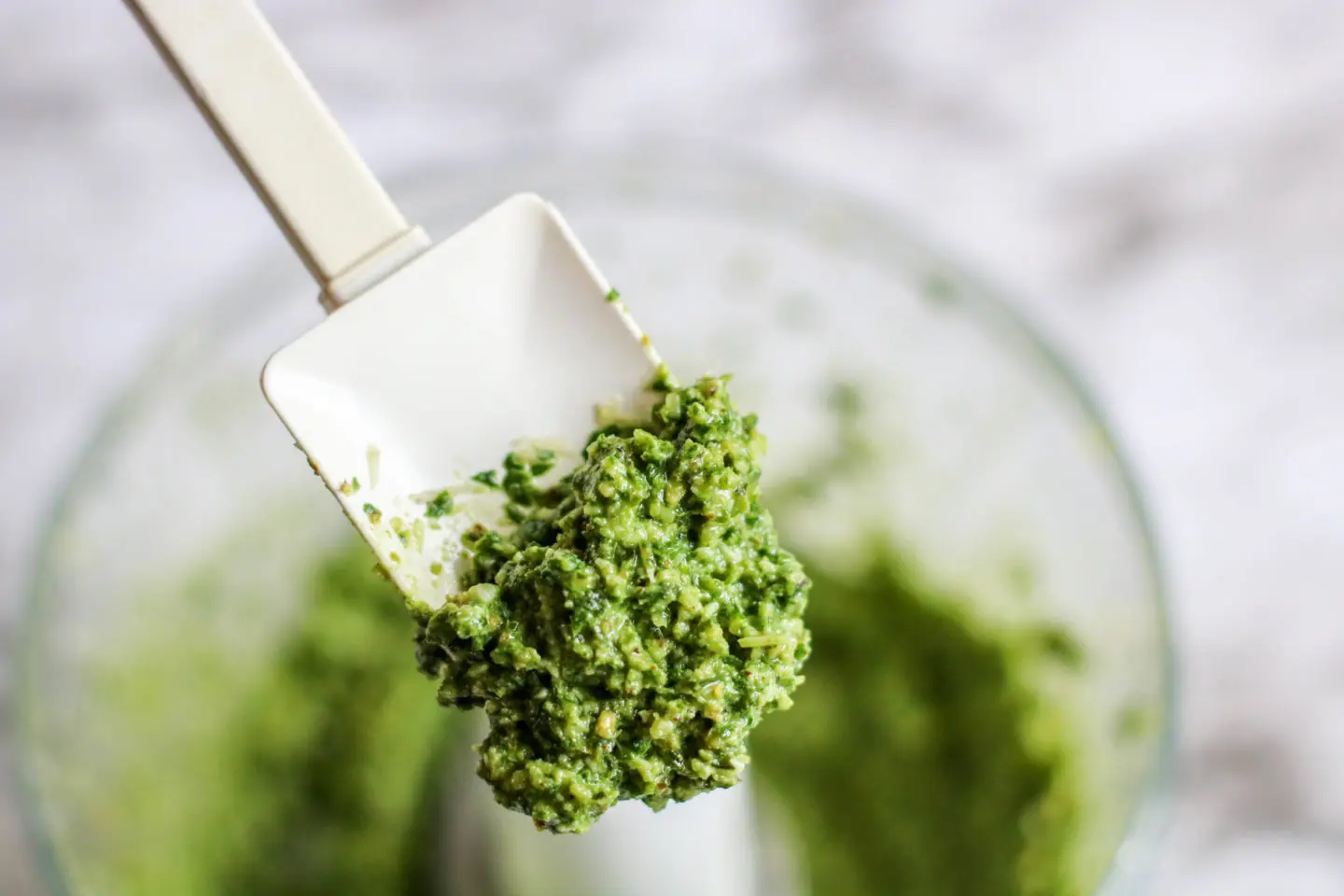 Beautiful pesto with a great texture and a bright green color. Fresh basil and walnut are paired up in this yummy recipe.