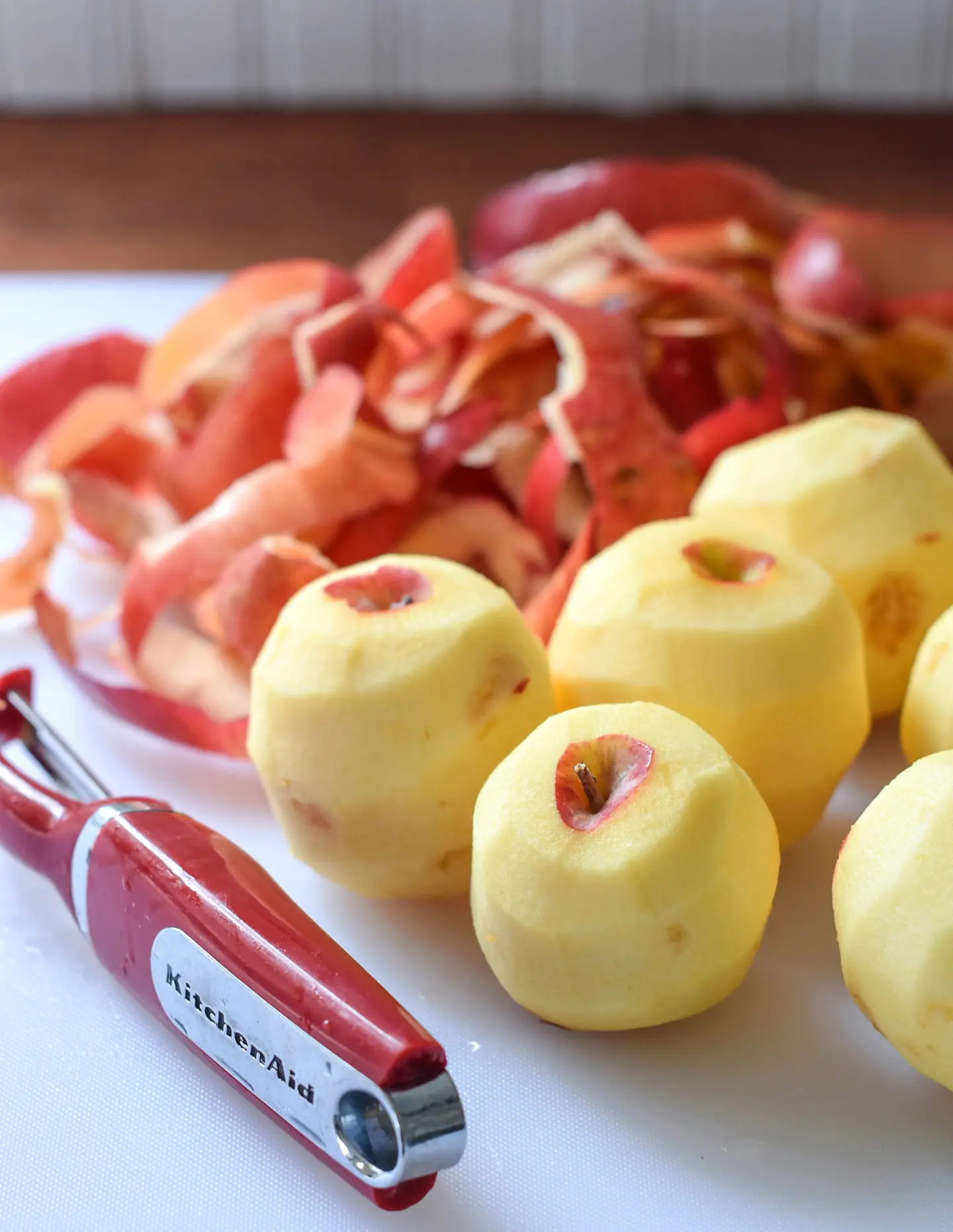 Apples peeled and ready to be sliced and cored for cake.