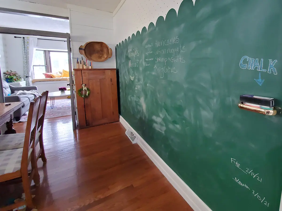 Schoolhouse green chalkboard wall in dining room