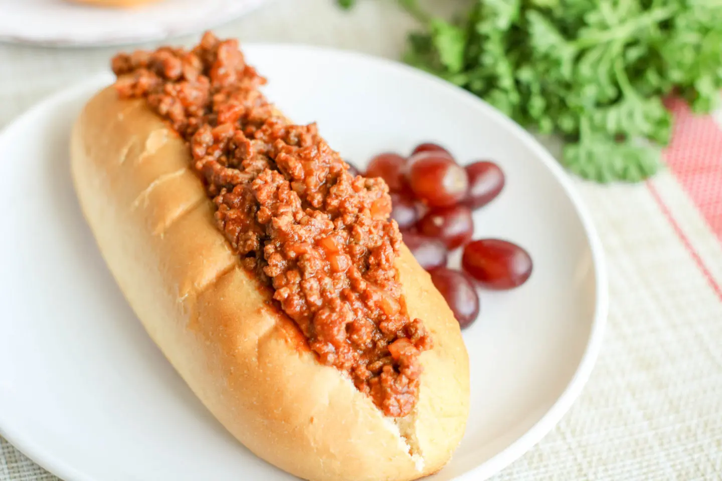 sloppy joe sauce in a bun ready to nosh on!