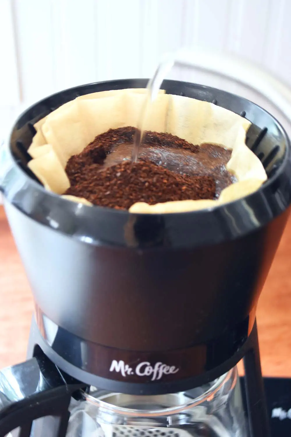 Pouring water into the Mr.Coffee Pour Over