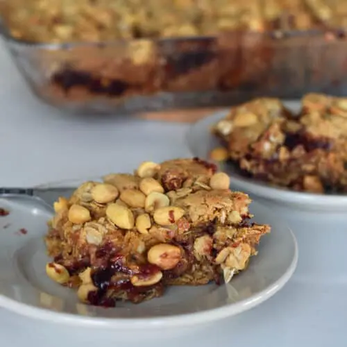 Peanut Butter and Jelly bars on a plate ready to be served.