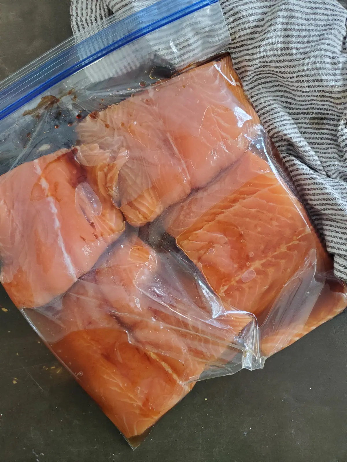 A ziplock bag of salmon marinating