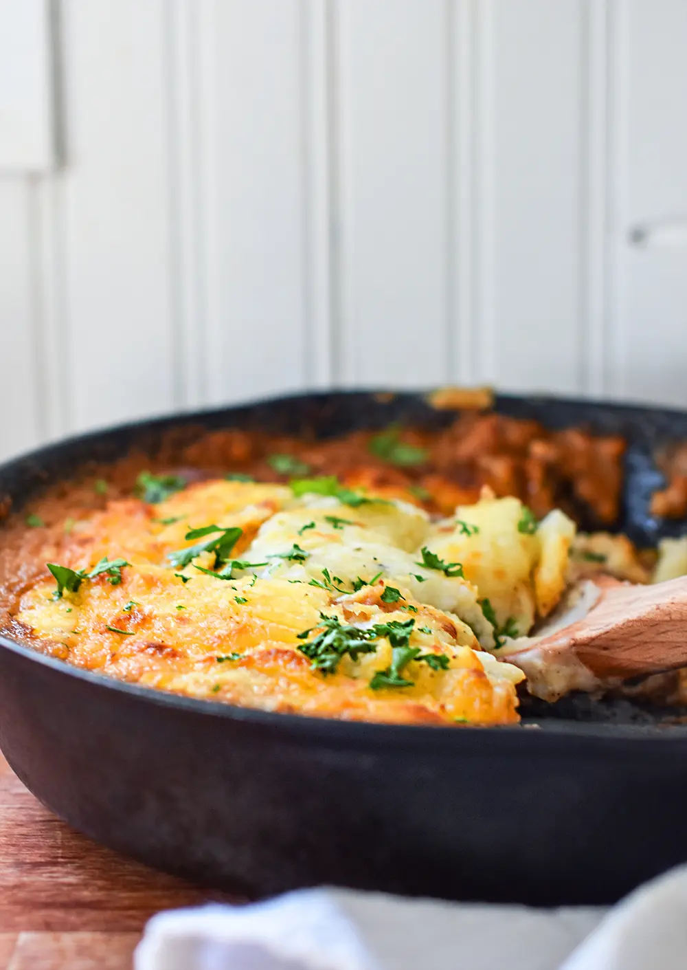 shepherds pie made up in a cast iron pan