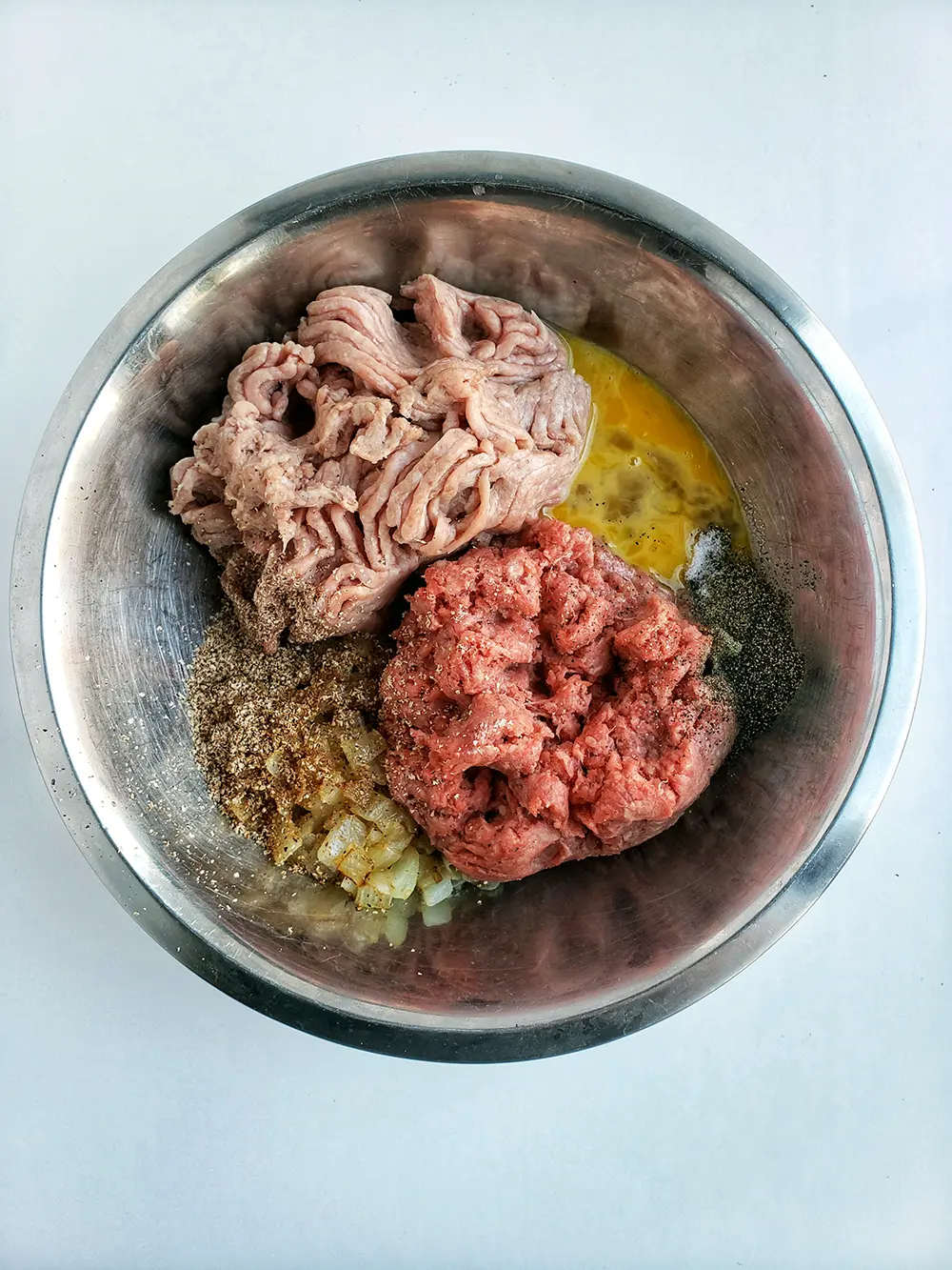 a bowl with swedish meatball ingredients