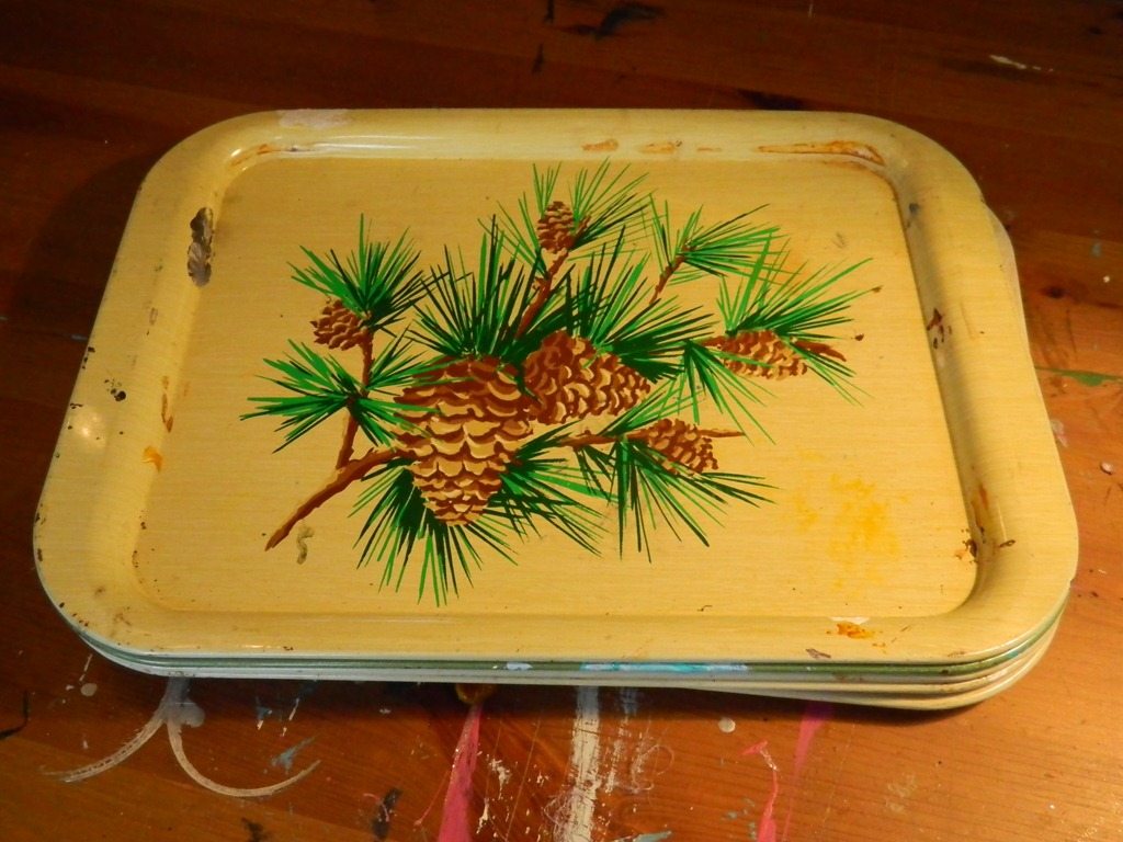 i am using halloween trays these on my wall as art in fact you might have seen that skull in my diy specimen jars modpodge printables and trays are