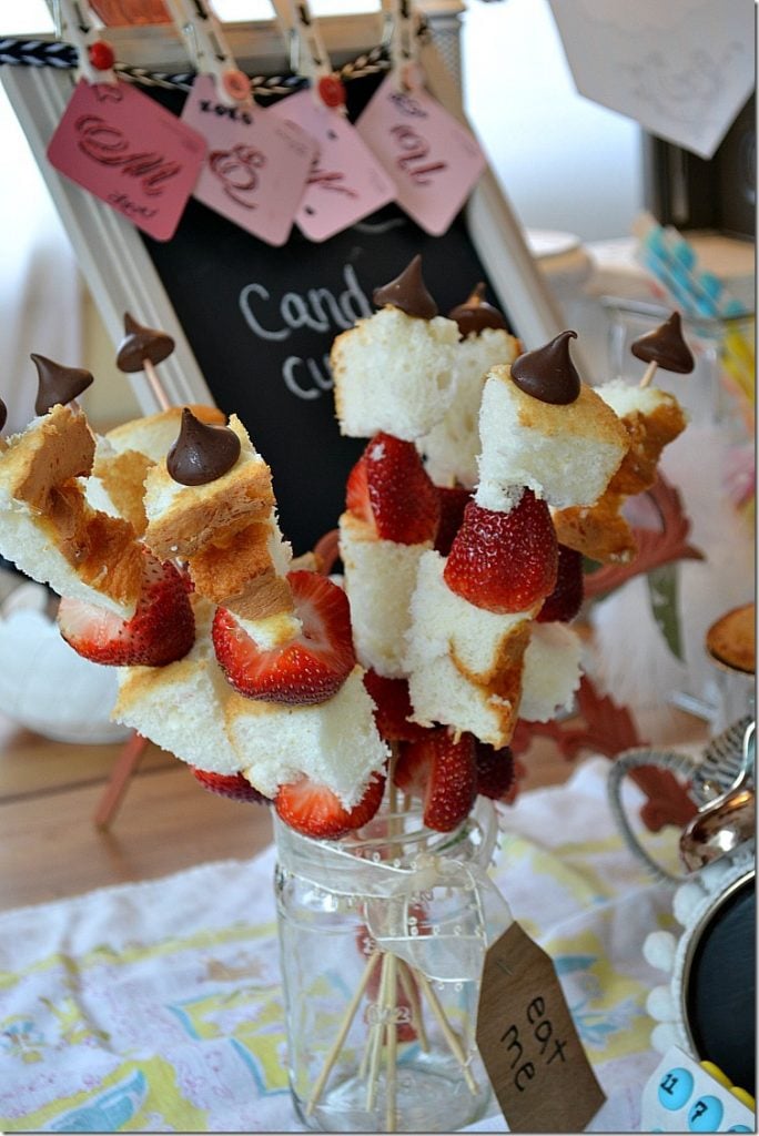 Strawberry Shortcake skewers. Angelfood cake and strawberries with a Hershey kiss on top. Strawberry Shortcake skewers. Angelfood cake and strawberries with a Hershey kiss on top.
