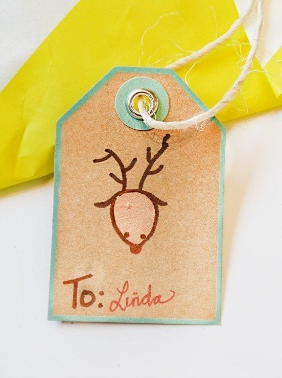 Thumbprint Christmas gift tags are a perfect way to include small children in the gift wrapping process. These are simple, easy and fun!