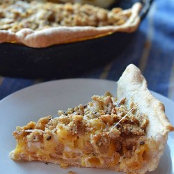 hearthy macaroni and cheese pizza is a fun twist on a favorite! A great pizza for family pizza night! This macaroni pizza recipe is simple and delicious!