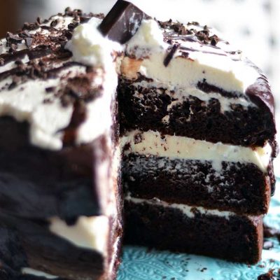 This easy chocolate tuxedo cake is super delicious, and because it doesn't have hard frosting techniques, is a great layered cake for beginners!