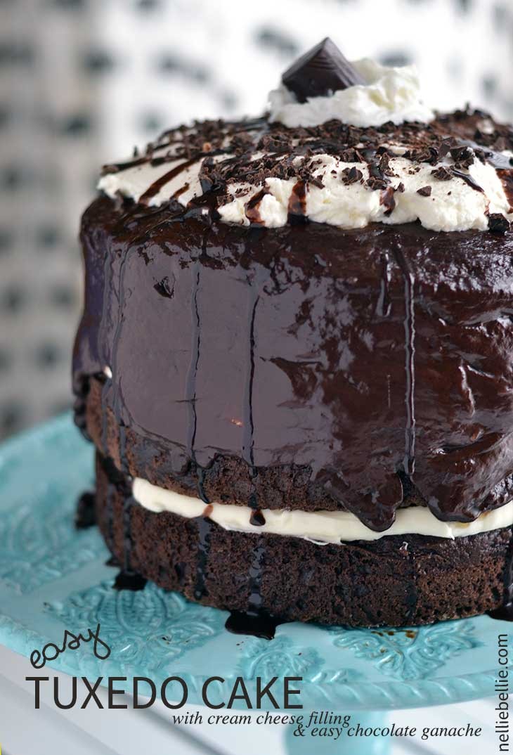 easy Tuxedo cake with cream cheese filling and chocolate ganache. Hard to believe this cake is easy...but it is! And delicious for a special dessert. From nelliebellie.com